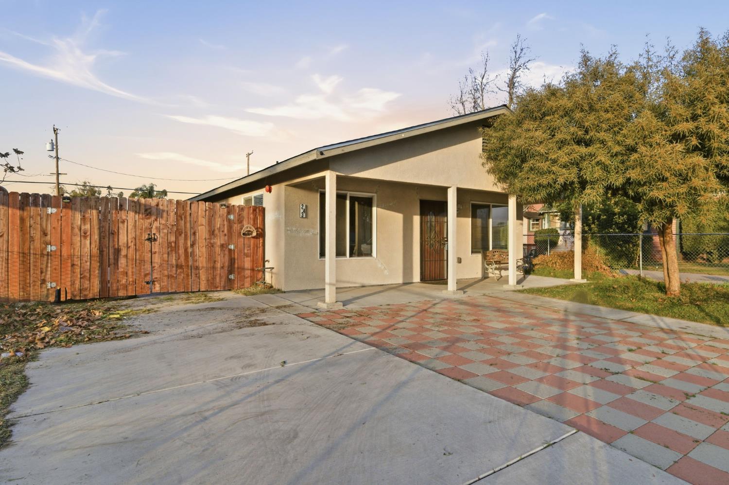 243 Angelus Street Turlock, CA 95380 - Photo 25 of 26 a view of a house with a backyard