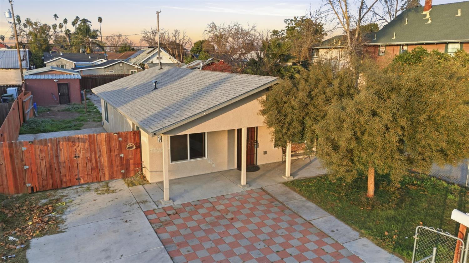 243 Angelus Street Turlock, CA 95380 - Photo 26 of 26 a view of a house with a yard