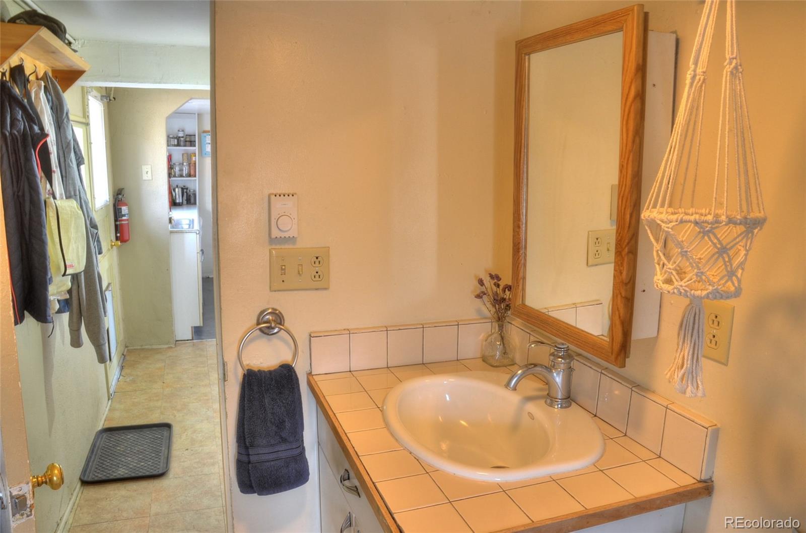 1406 G Street, Unit B Salida, CO 81201 - Photo 18 of 24 a bathroom with a tub and a sink