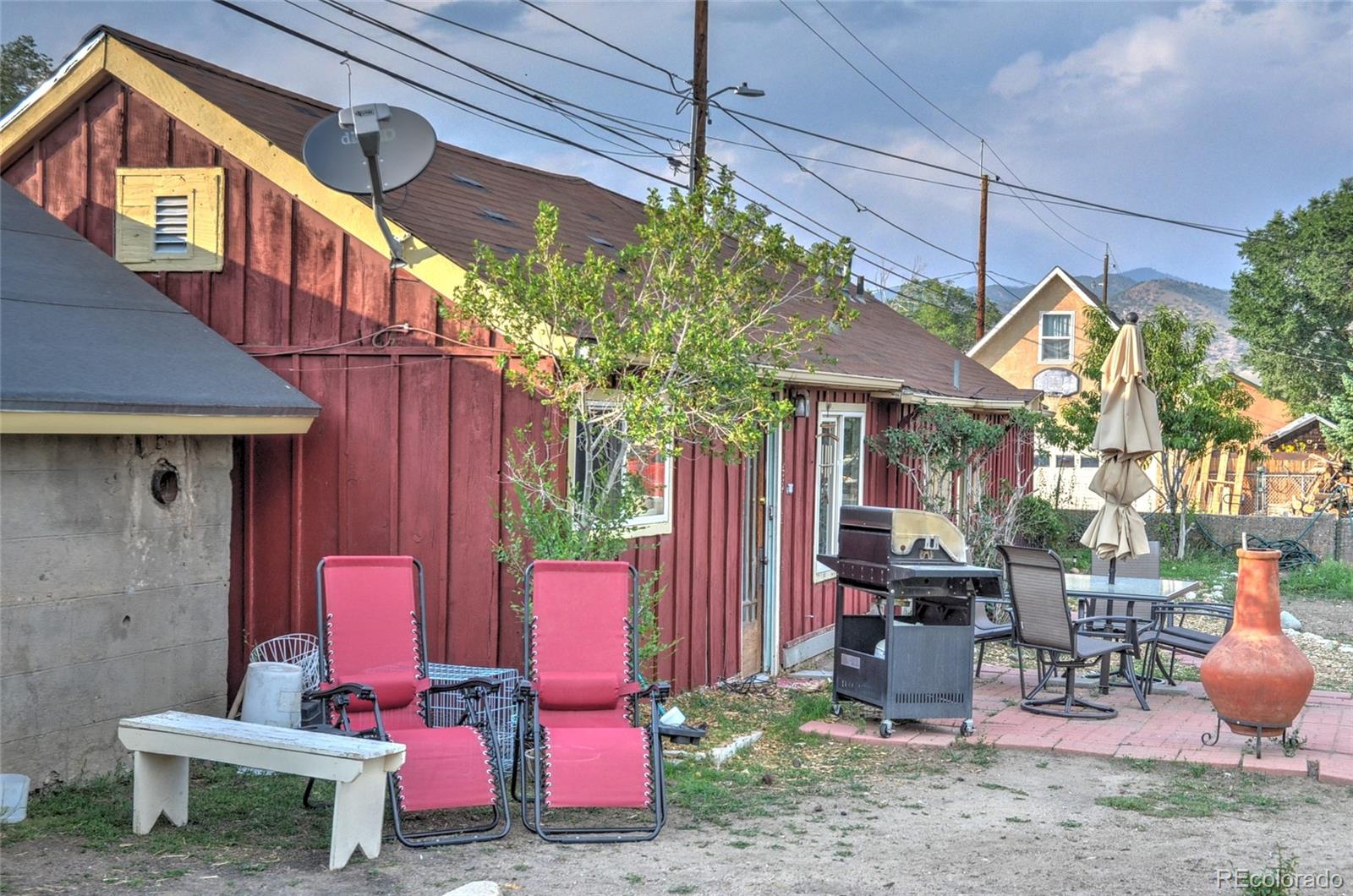 1406 G Street, Unit B Salida, CO 81201 - Photo 3 of 24 a front view of a house with outdoor seating