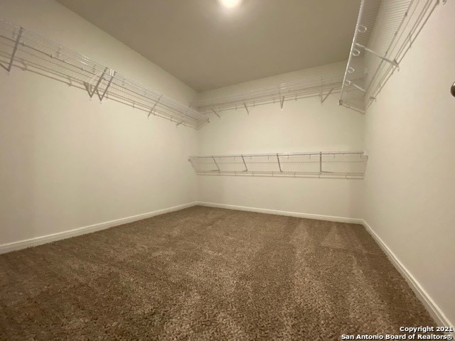 9310 Bennett Forest Converse, TX 78109 - Photo 20 of 24 a view of a room with racks on the wall