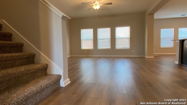 9310 Bennett Forest Converse, TX 78109 - Photo 4 of 24 a view of an empty room with wooden floor and a window