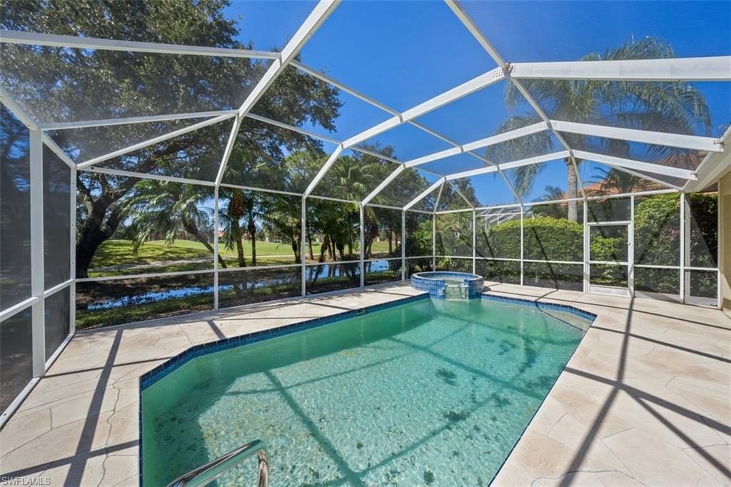 156 Napa Ridge Way Naples, FL 34119 - Photo 21 of 21 a view of a backyard