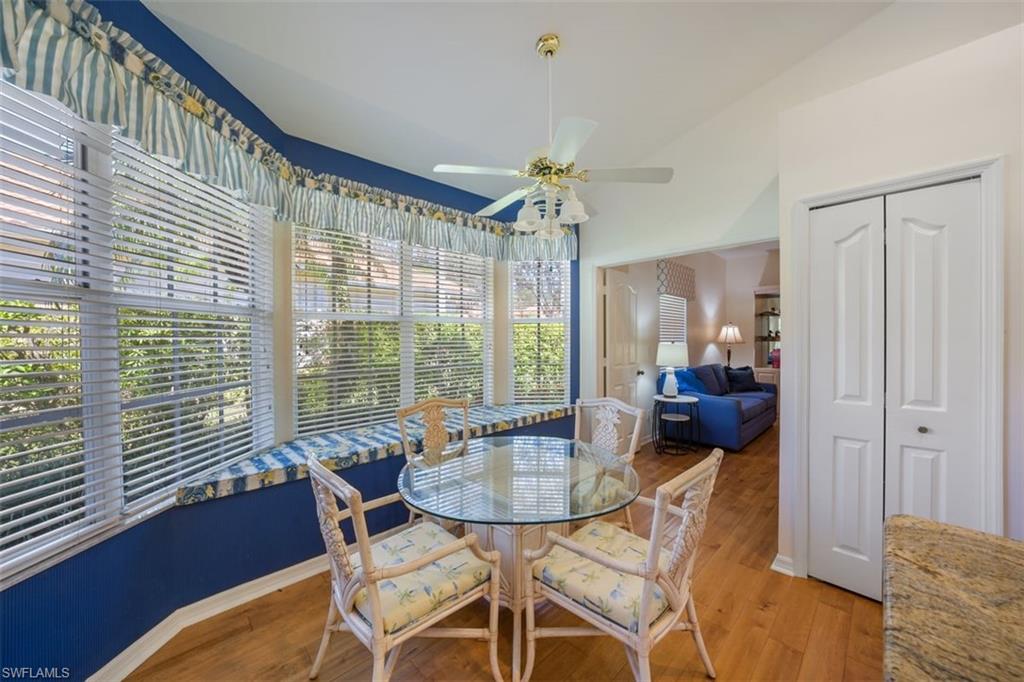 156 Napa Ridge Way Naples, FL 34119 - Photo 8 of 21 a view of a dining room with furniture window and outside view