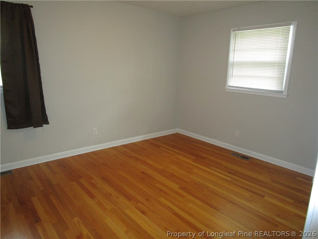 2516 Cumberland Road Fayetteville, NC 28306 - Photo 12 of 20 an empty room with a window