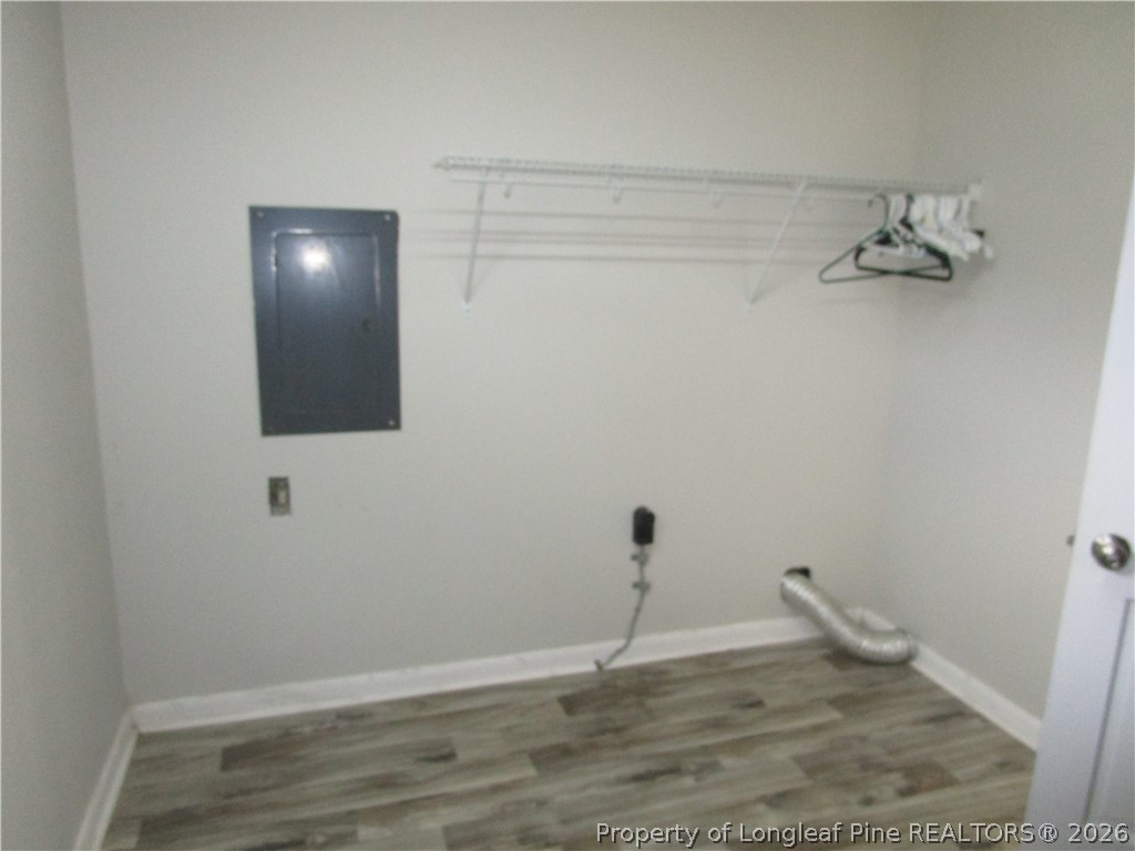 2516 Cumberland Road Fayetteville, NC 28306 - Photo 16 of 20 a view of a room with rack on the wall