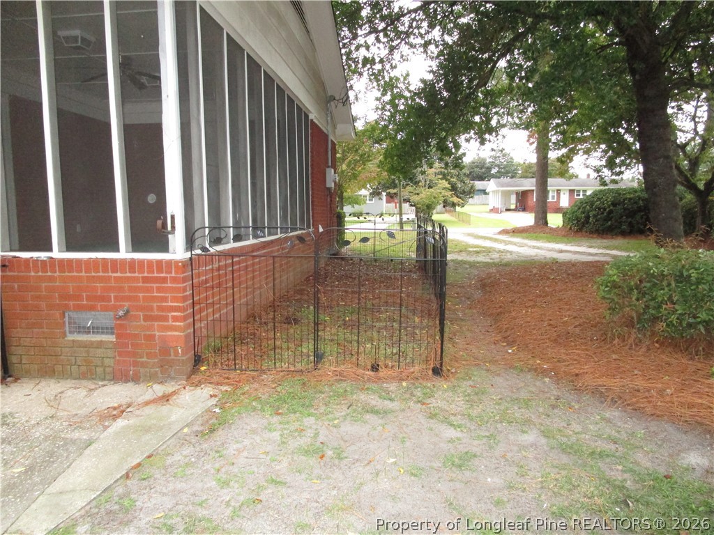 2516 Cumberland Road Fayetteville, NC 28306 - Photo 18 of 20 a view of entrance gate of a house