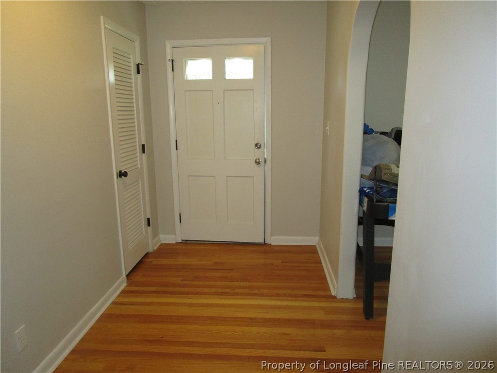 2516 Cumberland Road Fayetteville, NC 28306 - Photo 2 of 20 a view of a hallway with wooden floor and entryway