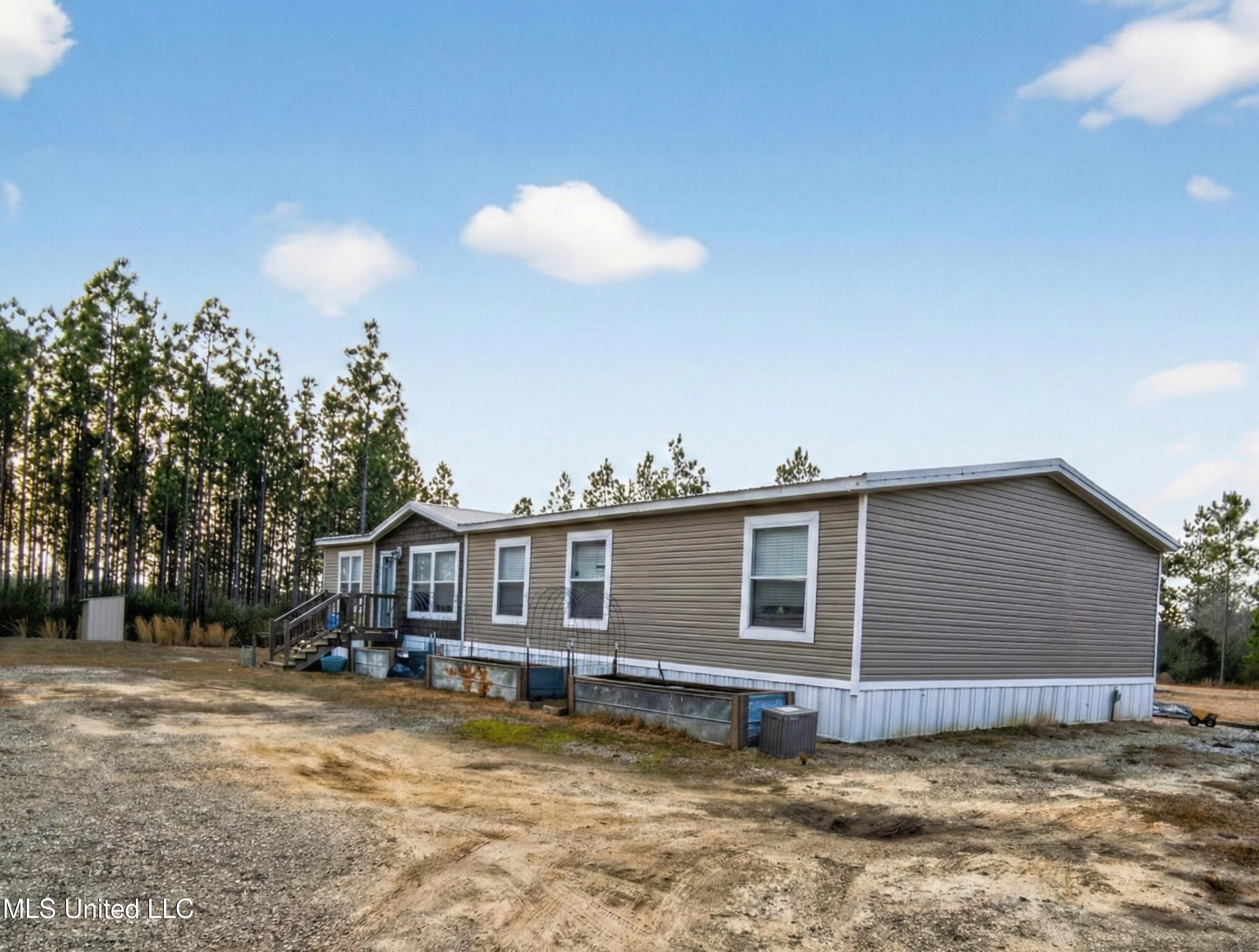 8900 Nannys Road Vancleave, MS 39565 - Photo 1 of 16 8900 Nannys Rd.