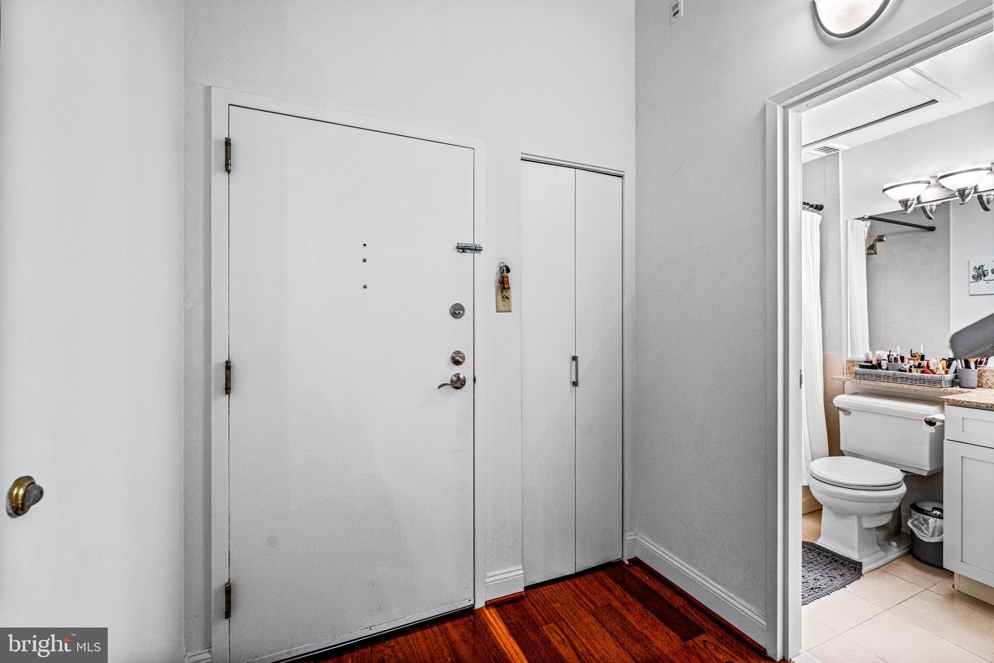 2429-41 Locust Street, Unit 219 Philadelphia, PA 19103 - Photo 7 of 28 a view of room with wooden floor