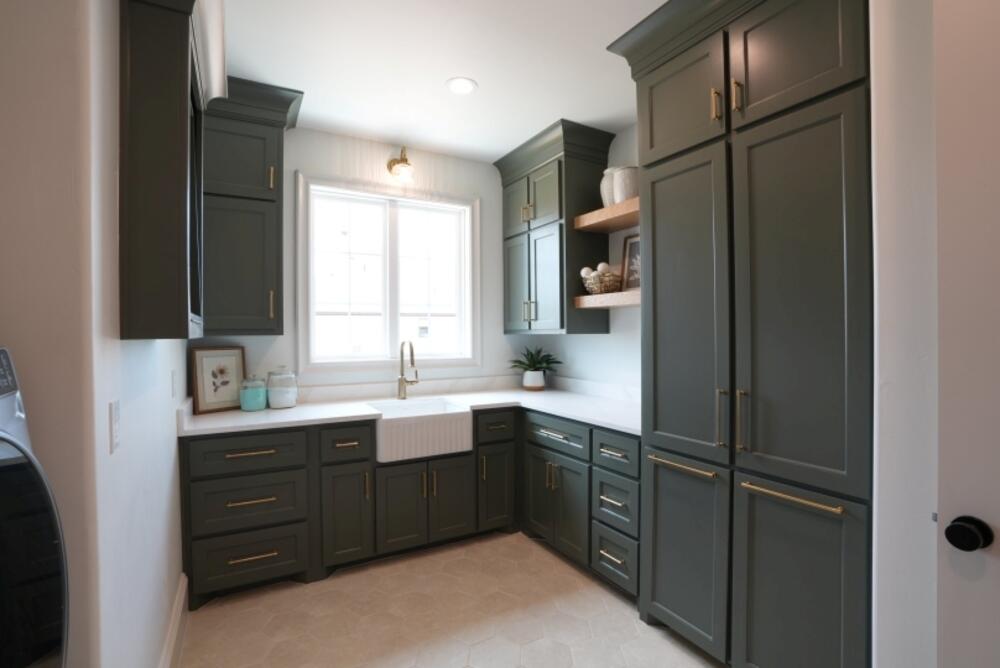 4101 149th Street Lubbock, TX 79423 - Photo 13 of 53 a kitchen with a sink cabinets and window