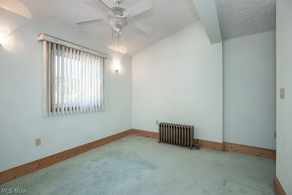 3571 Harvey Road Cleveland, OH 44118 - Photo 15 of 40 Bedroom with vaulted ceiling, carpet, and ceiling fan