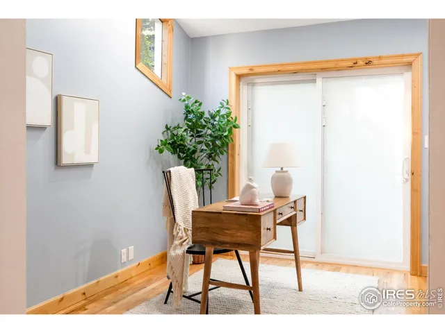 a workspace with furniture and a window