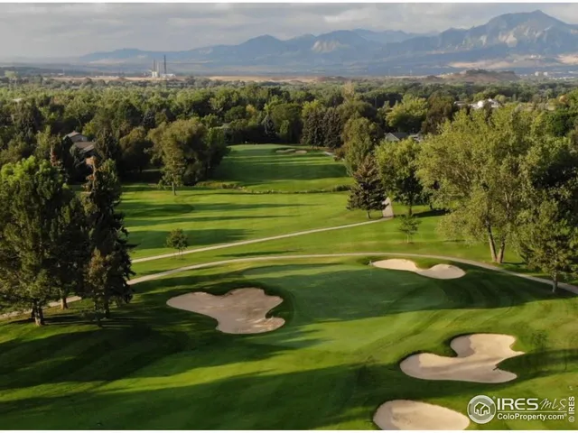a view of a golf course with a garden