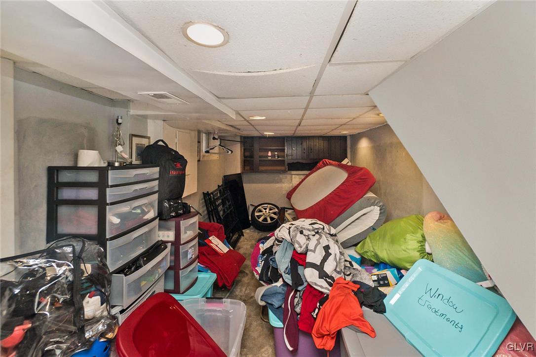 1017 Spring Street Bethlehem, PA 18018 - Photo 11 of 26 a view of walk in closet with clothes and shoes
