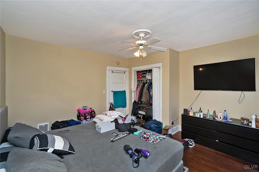 1017 Spring Street Bethlehem, PA 18018 - Photo 15 of 26 a living room with furniture and a flat screen tv