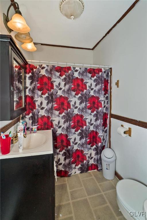 1017 Spring Street Bethlehem, PA 18018 - Photo 17 of 26 a bathroom with a sink toilet and shower