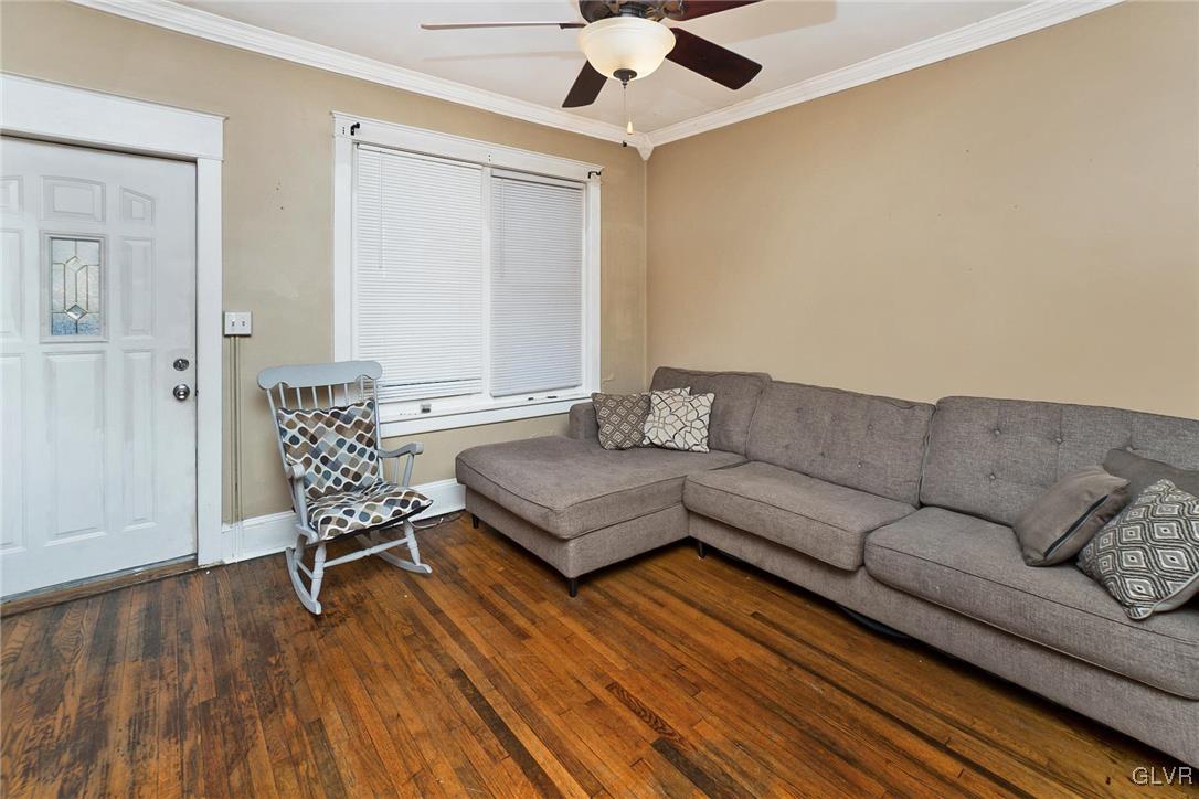 1017 Spring Street Bethlehem, PA 18018 - Photo 3 of 26 a living room with furniture and a wooden floor