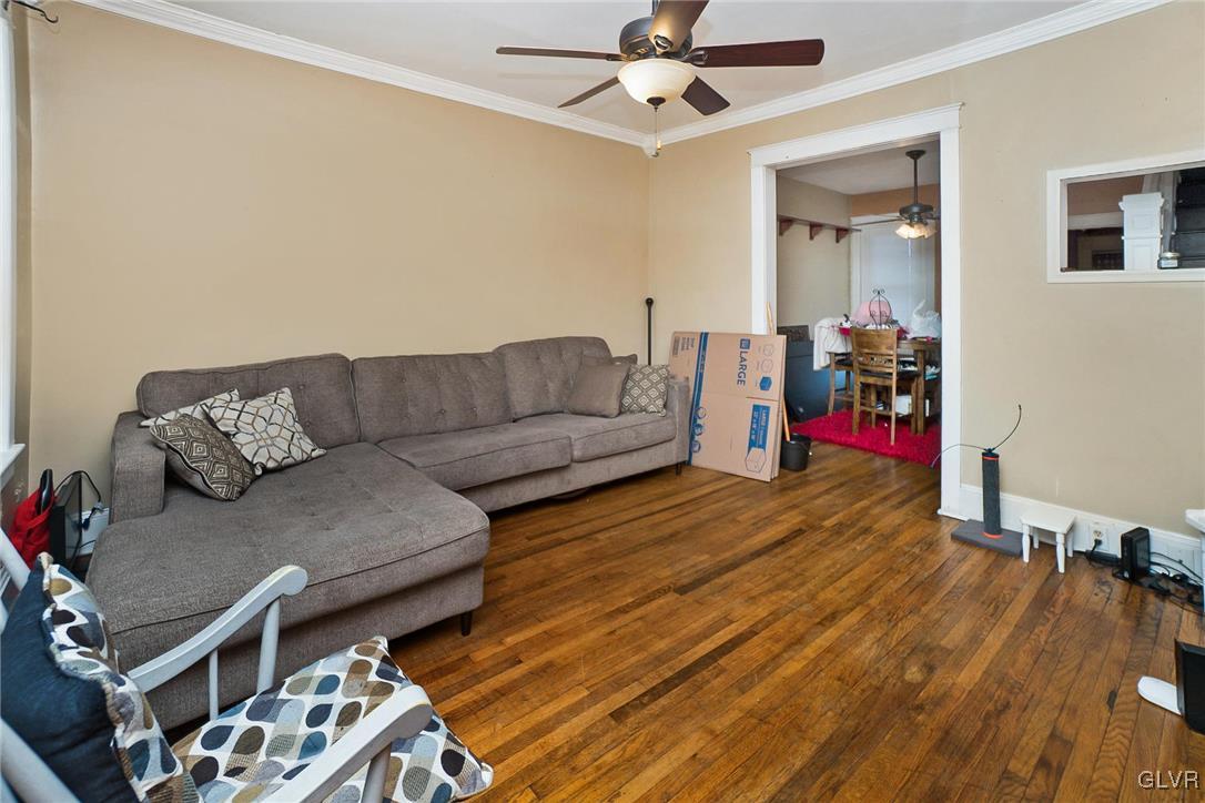 1017 Spring Street Bethlehem, PA 18018 - Photo 4 of 26 a living room with furniture and a wooden floor