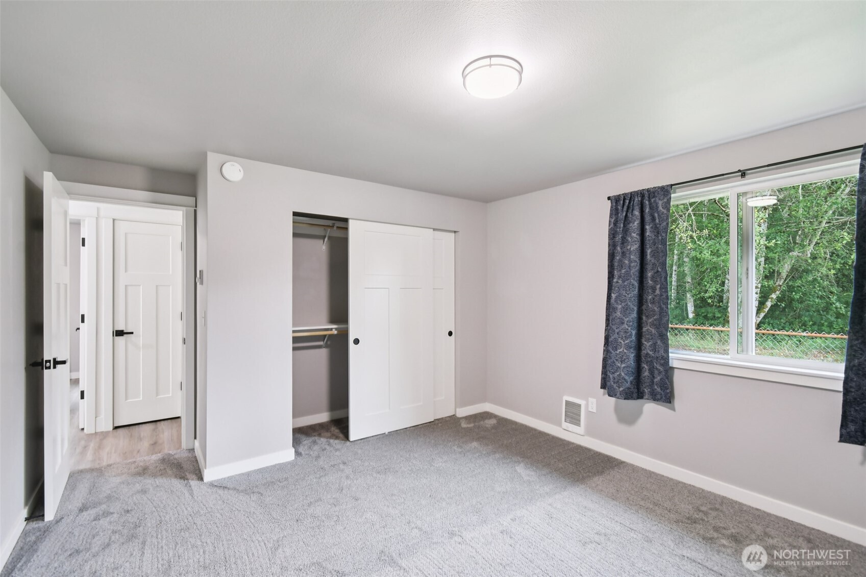 429 Fir Street McCleary, WA 98557 - Photo 18 of 21 an empty room with windows and closet