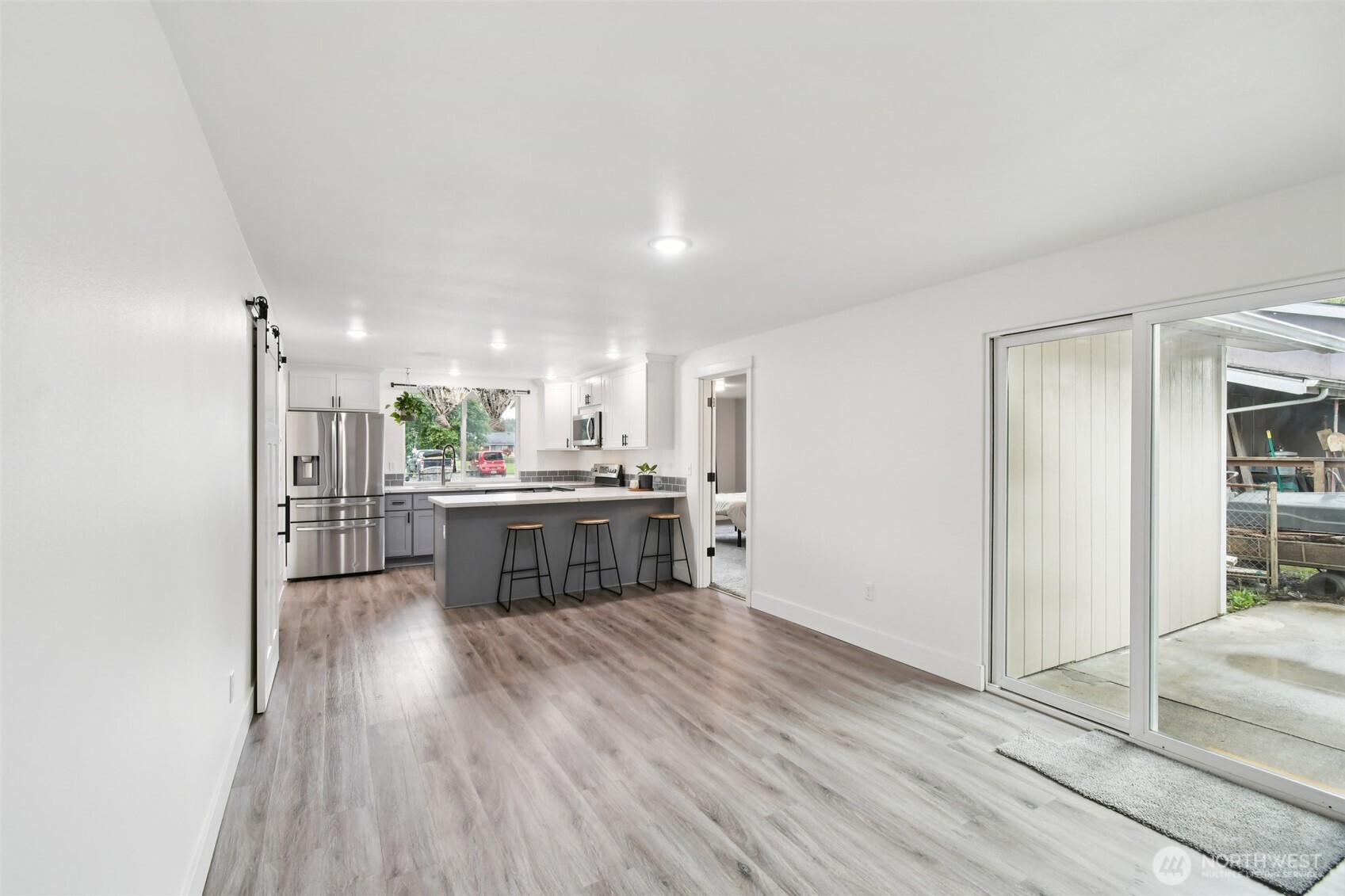 429 Fir Street McCleary, WA 98557 - Photo 10 of 21 a kitchen with stainless steel appliances a sink and a refrigerator