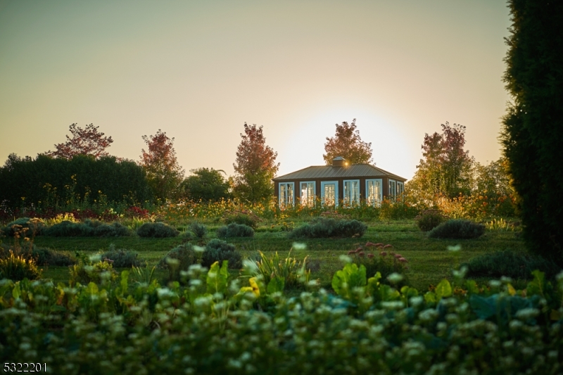 43 Abby Road Peapack, NJ 07977 - Photo 20 of 25 a front view of a house with a yard