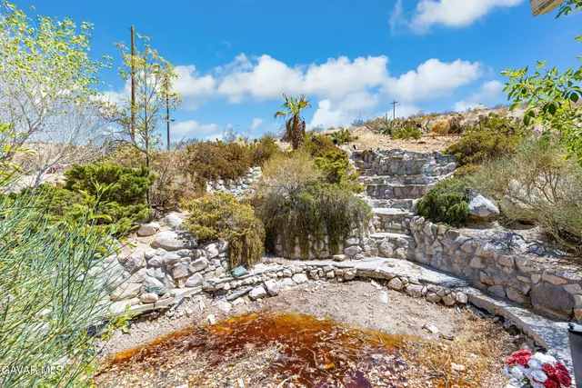 a view of a balcony with chairs