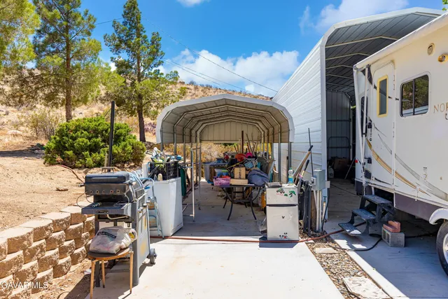 a view of a pathway both side of yard
