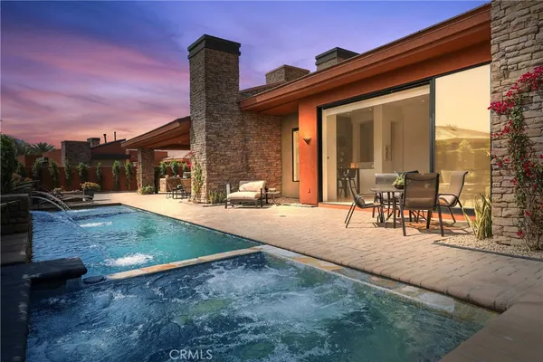 a view of outdoor space with seating area