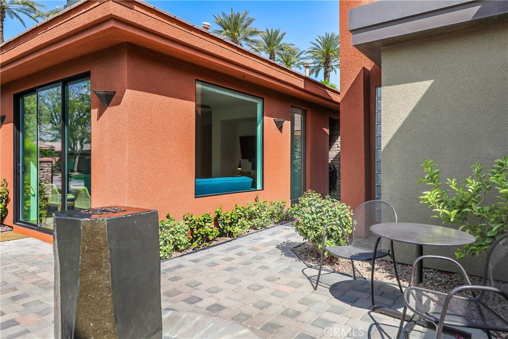 50070 Vía De Moda La Quinta, CA 92253 - Photo 29 of 32 a front view of a house with a yard