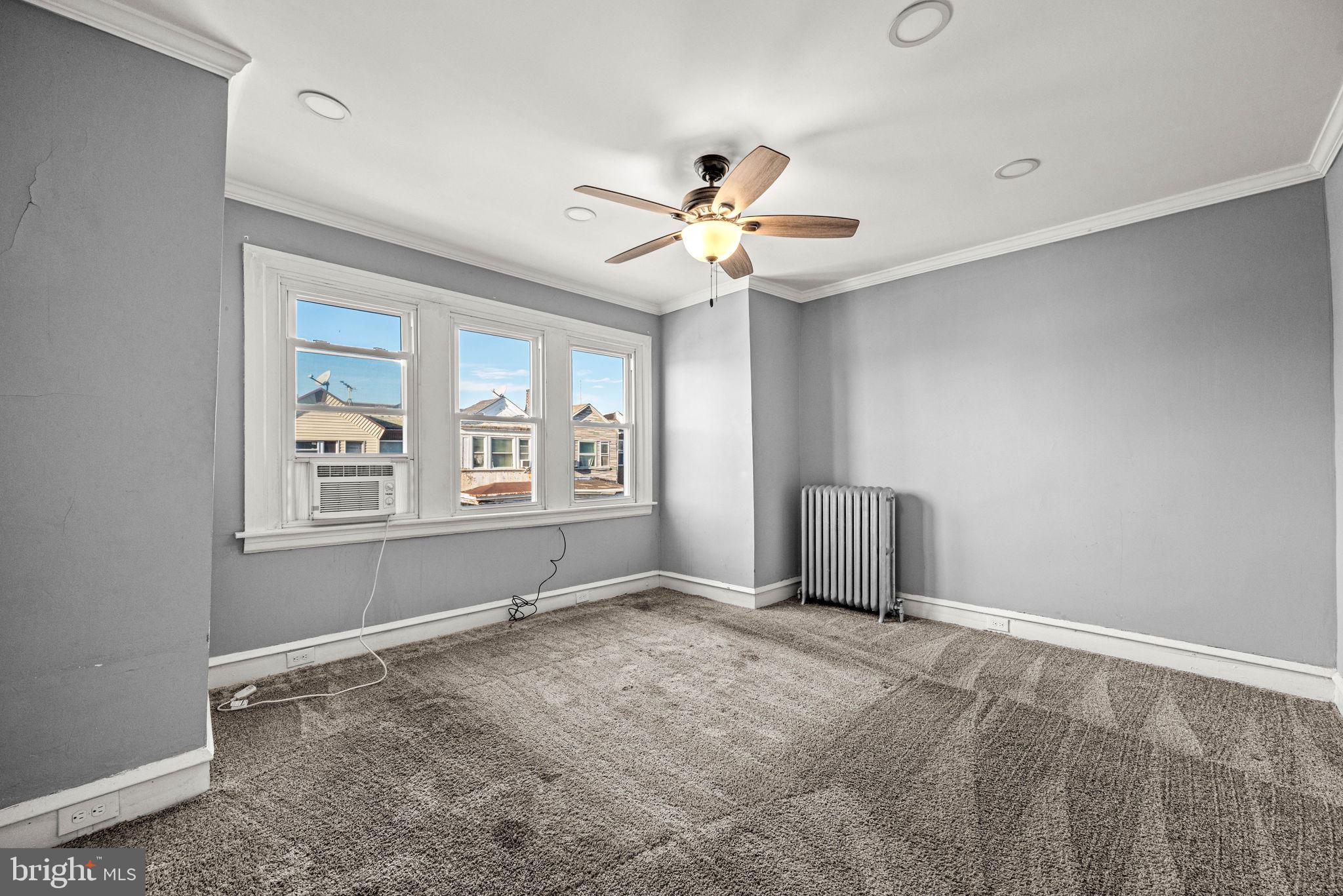5426 Windsor Street Philadelphia, PA 19143 - Photo 15 of 22 a view of an empty room with a window
