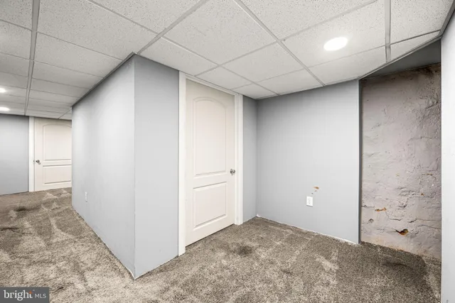 a view of a hallway with closet