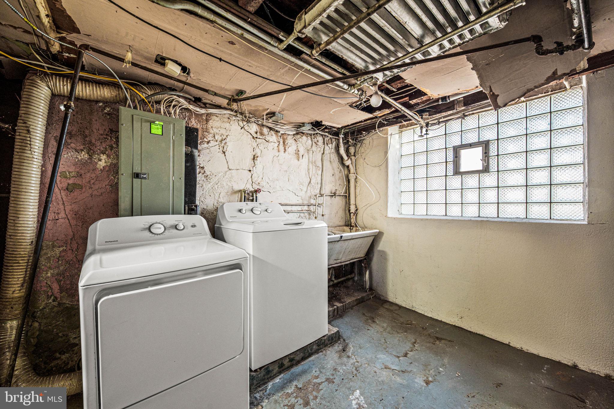 5426 Windsor Street Philadelphia, PA 19143 - Photo 19 of 22 a utility room with dryer and washer