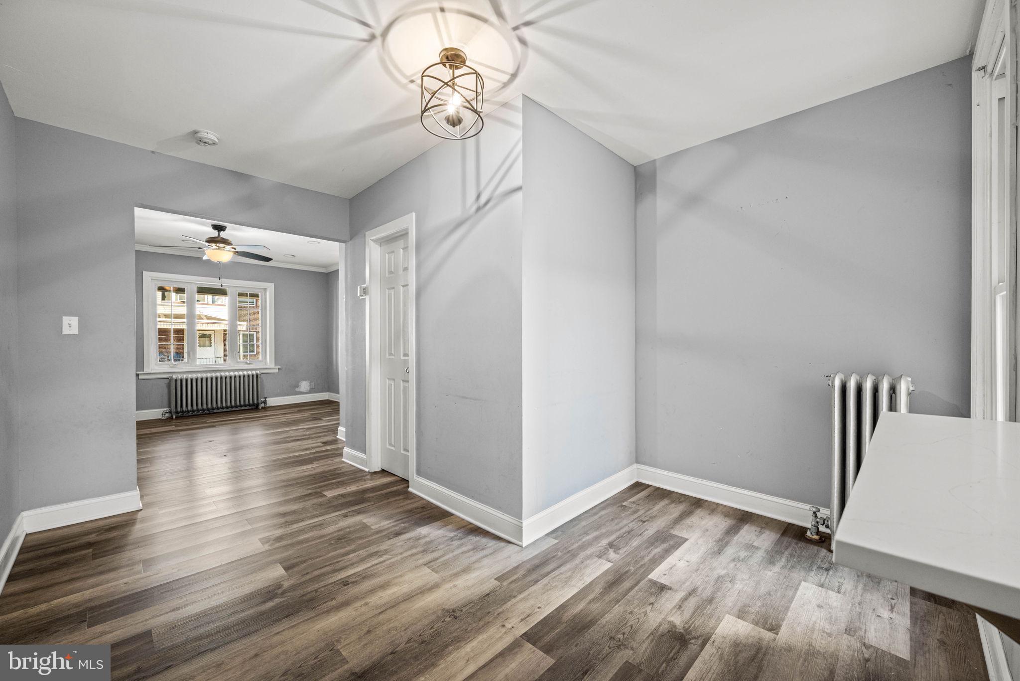 5426 Windsor Street Philadelphia, PA 19143 - Photo 5 of 22 a view of empty room with wooden floor
