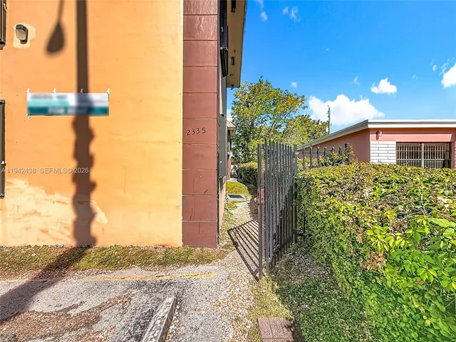a house view with a garden space