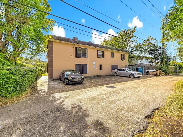 a view of a patio with a yard