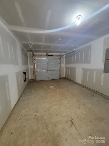 a bathroom with a toilet a sink a mirror and vanity