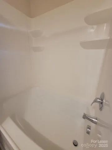 a view of a room that has a window