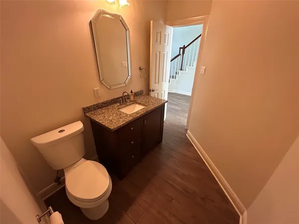 a view of entryway with wooden floor