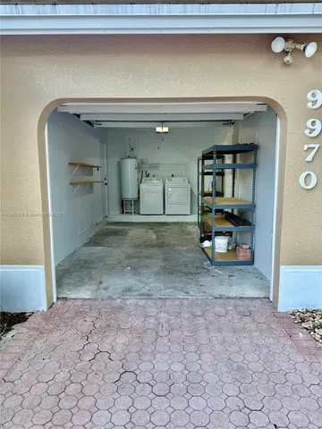 a view of a backyard of the house