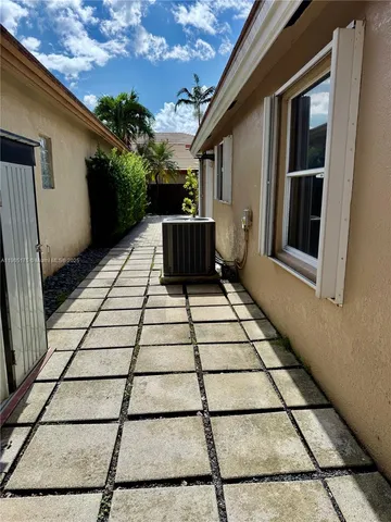 a view of a entryway door front of house