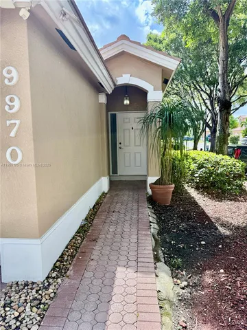 a view of a pathway with a house