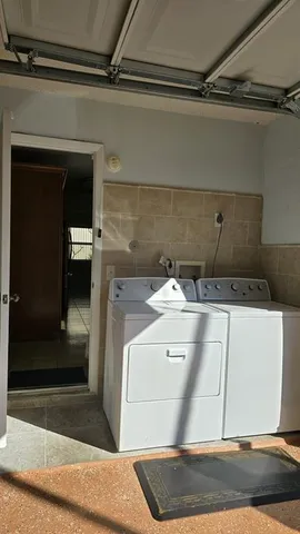 a utility room with a washer and dryer