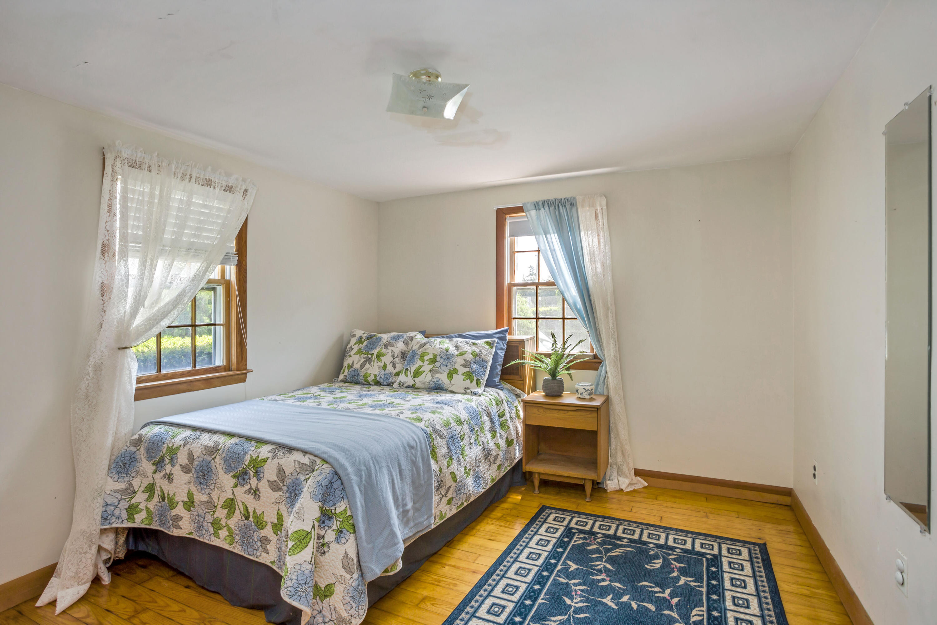 77 Susan Ruth Road Dennis Port, MA 02639 - Photo 12 of 25 a bedroom with a bed and a window
