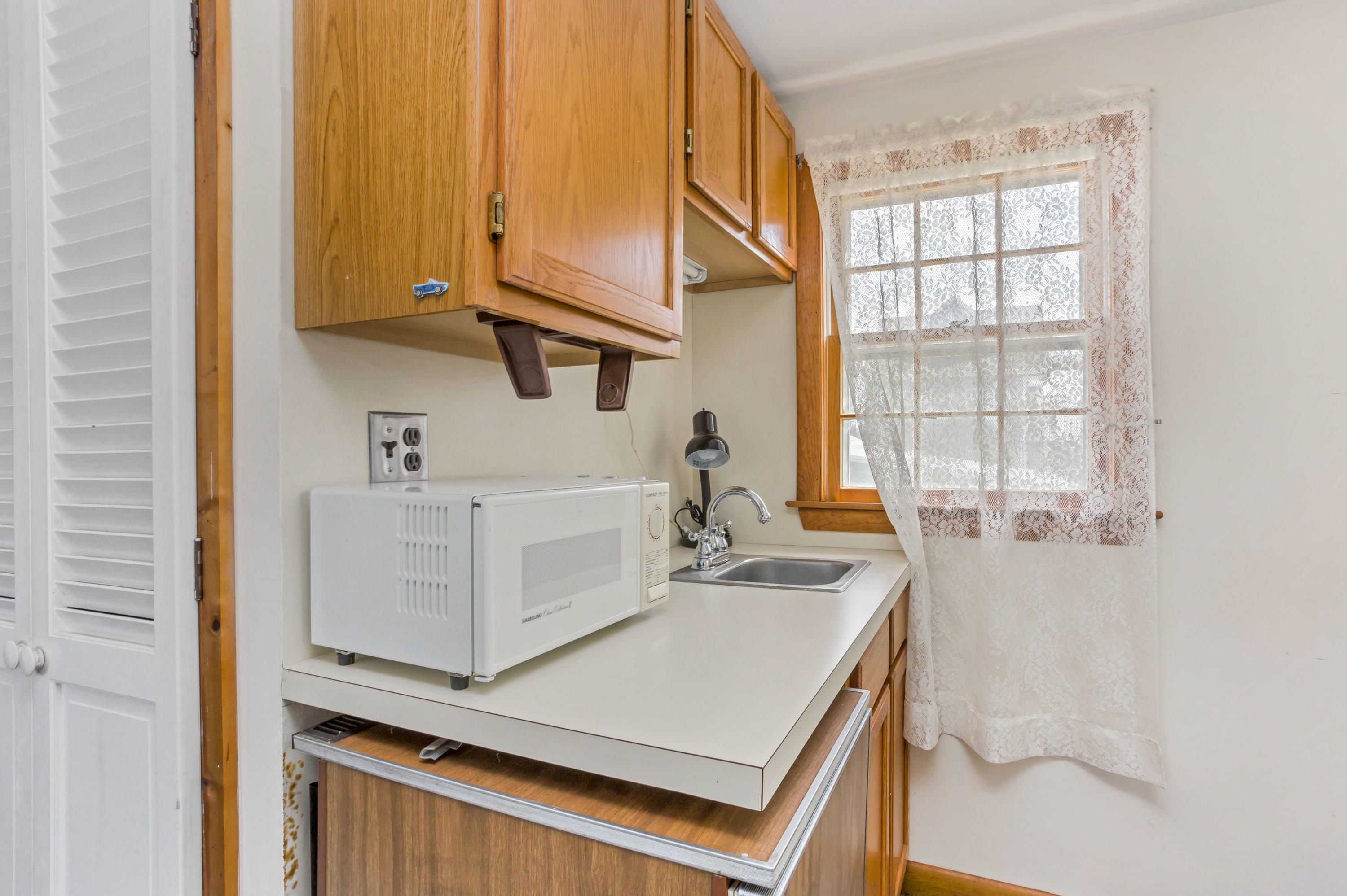 77 Susan Ruth Road Dennis Port, MA 02639 - Photo 15 of 25 a view of kitchen with furniture and window