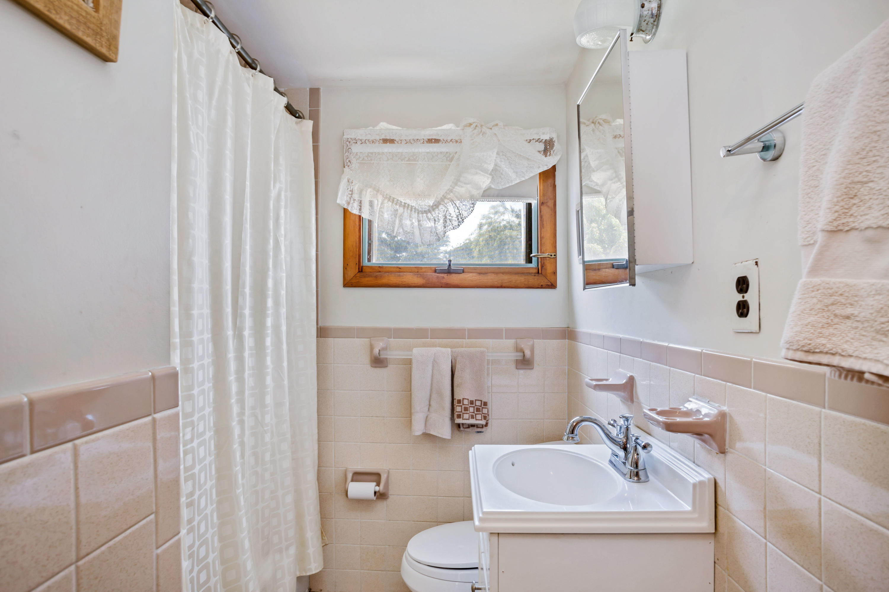 77 Susan Ruth Road Dennis Port, MA 02639 - Photo 19 of 25 a bathroom with a sink and a mirror