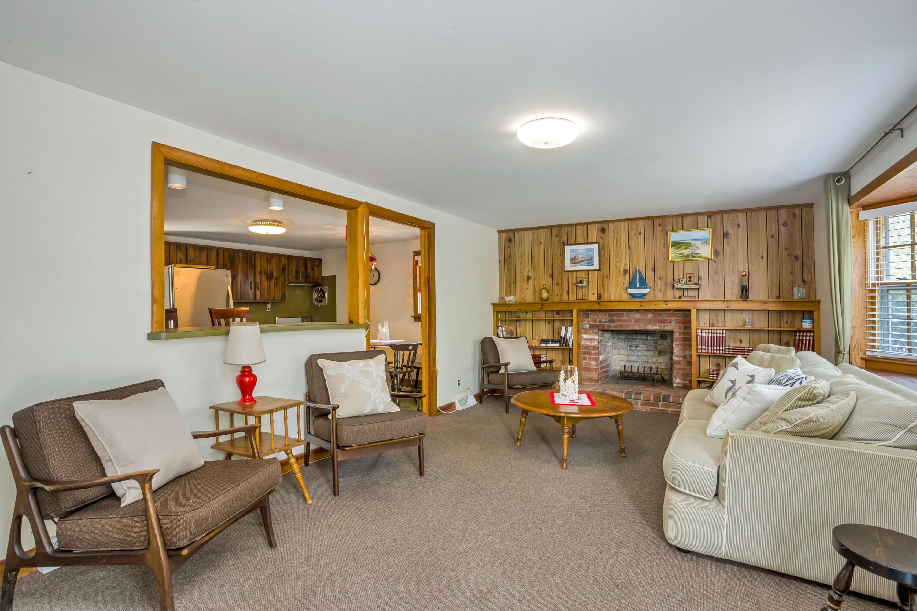 77 Susan Ruth Road Dennis Port, MA 02639 - Photo 5 of 25 a living room with furniture and a large window