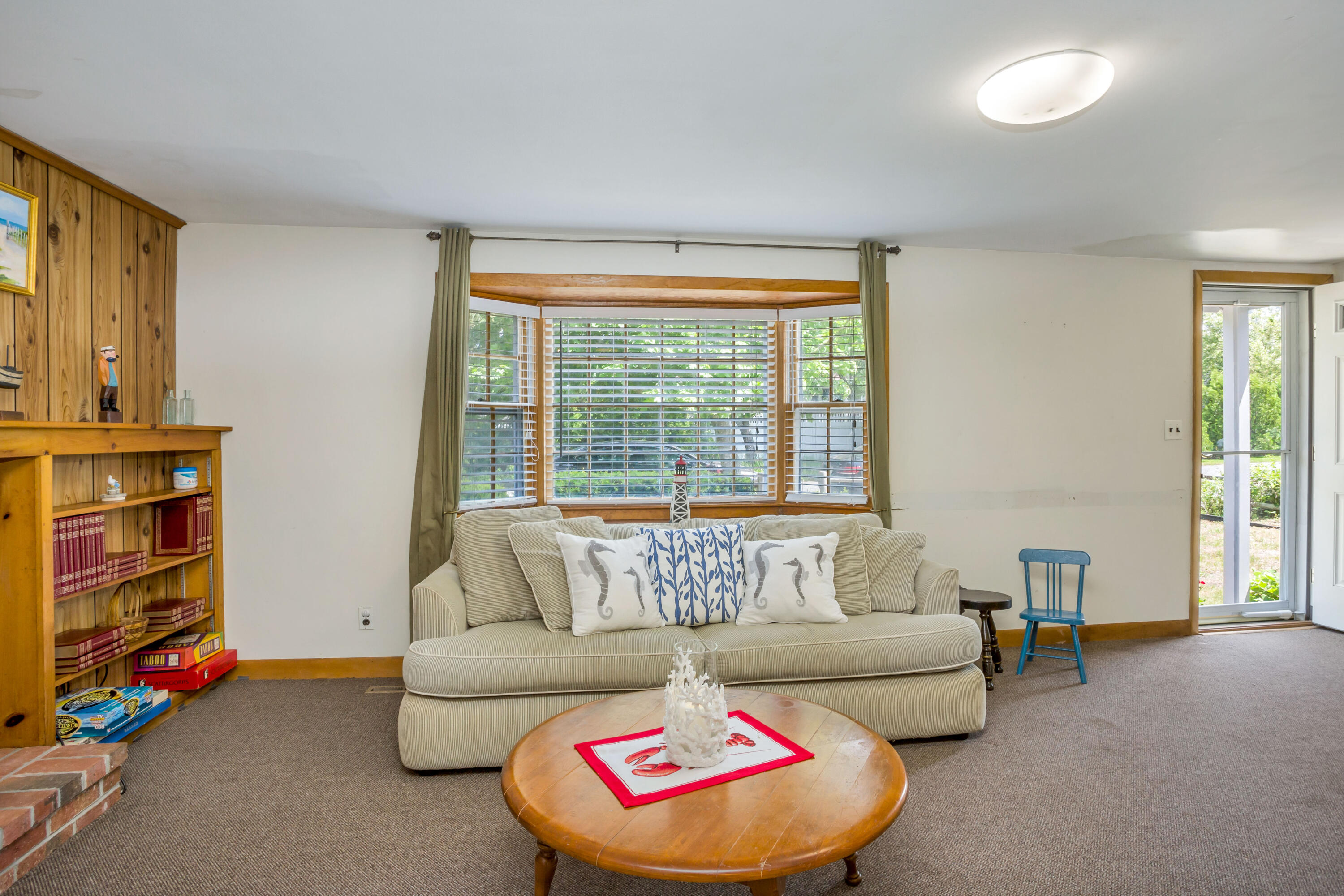 77 Susan Ruth Road Dennis Port, MA 02639 - Photo 7 of 25 a living room with furniture and a window
