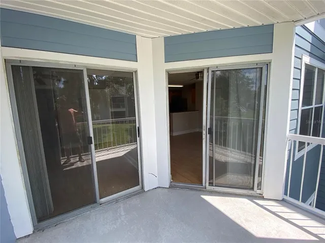 an empty room with sliding door