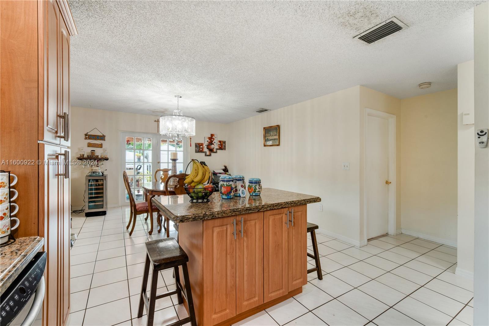 2245 Southwest 62nd Avenue Miami, FL 33155 - Photo 14 of 35 a view of a dining room with furniture and a window